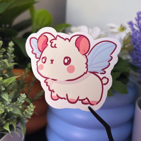 A cute hamster fairy sticker with pink ears and light blue wings.