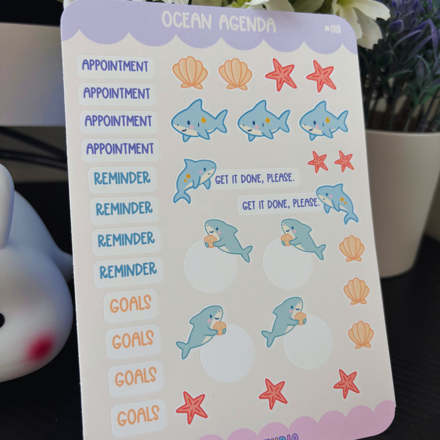 Ocean Agenda planner sticker sheet with sharks, shells, starfish, and text labels.