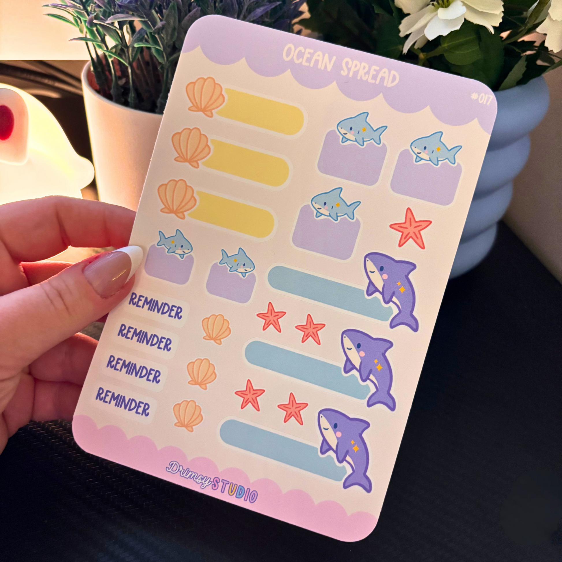 A planner sticker sheet with ocean-themed illustrations and functional labels.