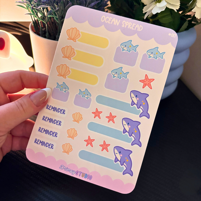 A planner sticker sheet with ocean-themed illustrations and functional labels.