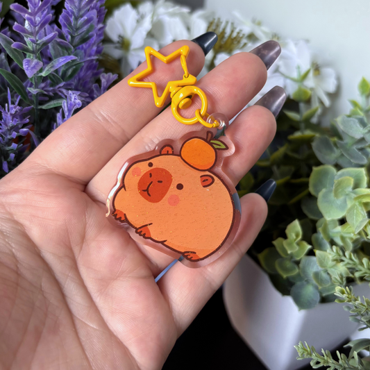 Capybara With Orange Epoxy Acrylic Keychain | Glittery Accessory with Star Key Ring