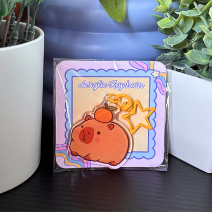 Capybara With Orange Epoxy Acrylic Keychain | Glittery Accessory with Star Key Ring